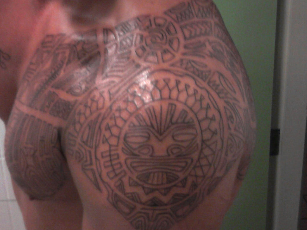 polynesian tattoo halfway by